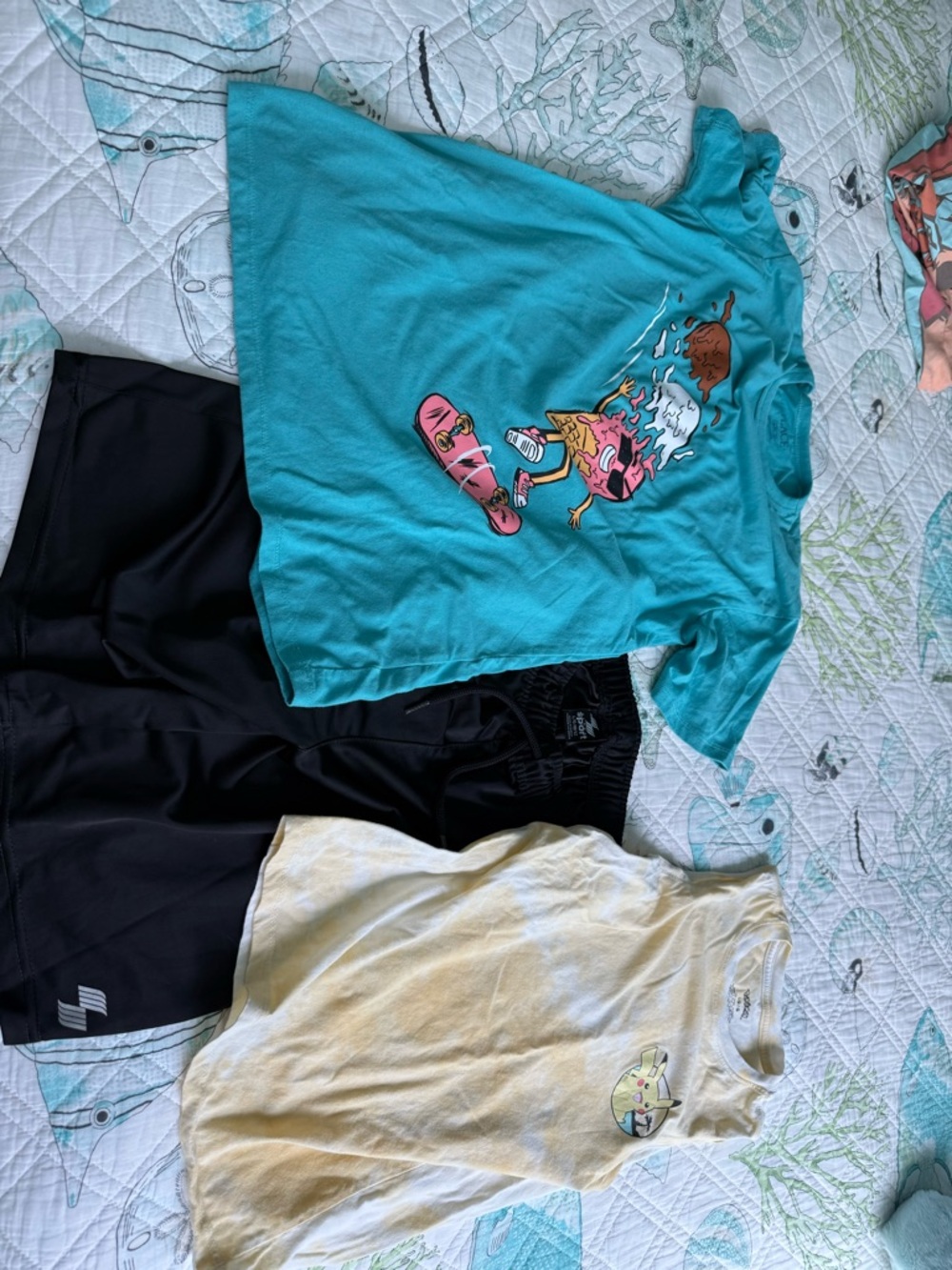 Kids XL Teal shirt, 1L yellow Pokemon tank and L 10-12 black shorts